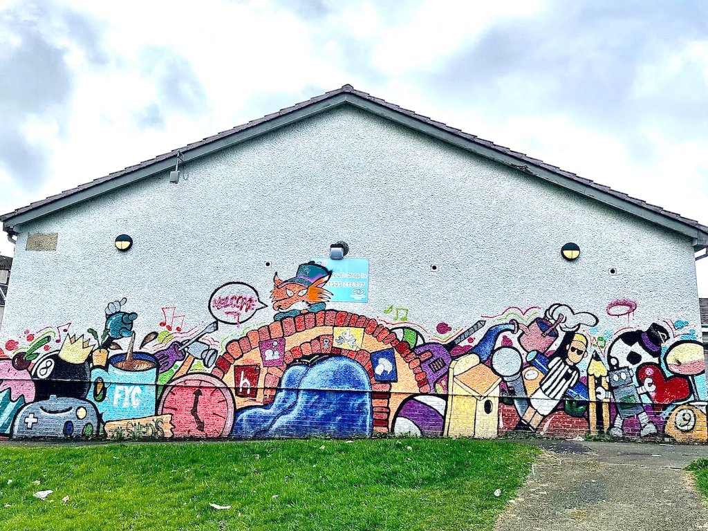 Paisley mural No. 32: "Kids Mural" on Spey Avenue Community Centre, Foxbar, Paisley, Paisley town centre