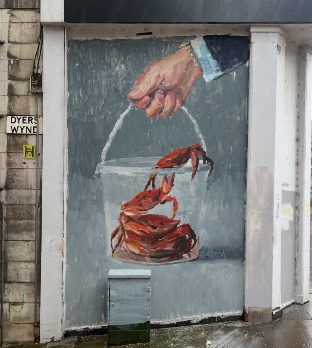 Paisley mural No. 51: "The Crab Bucket" by Mark Worst on Dyers Wynd, Paisley town centre.